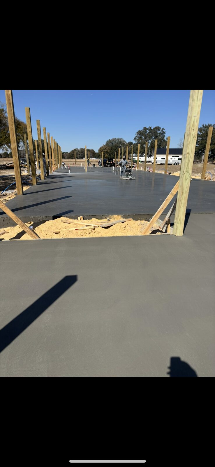 Large pole barn concrete slab with smooth power-troweled finish